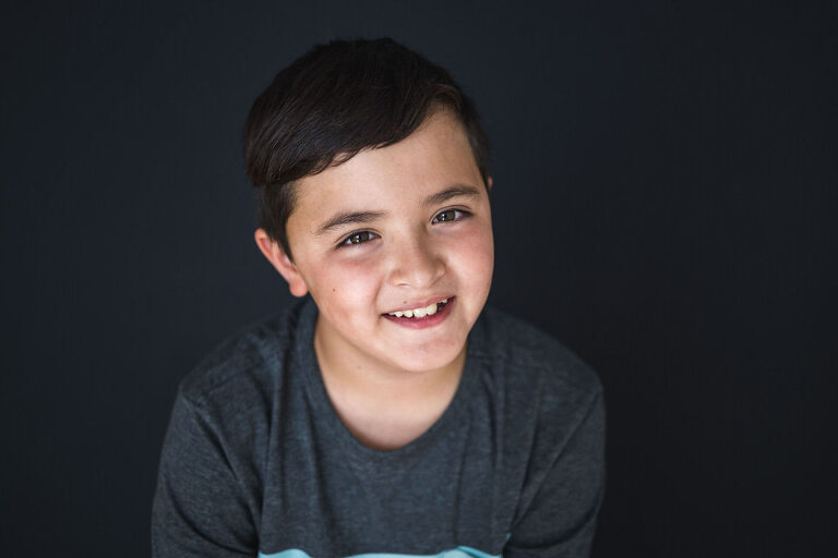 smiling 9 year old boy's school picture